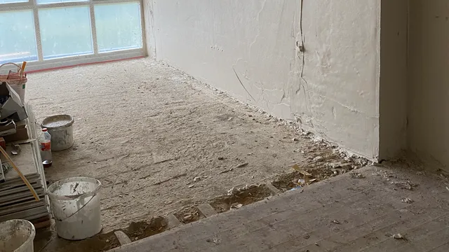 Verputzte Fassade eines Wohngebäudes